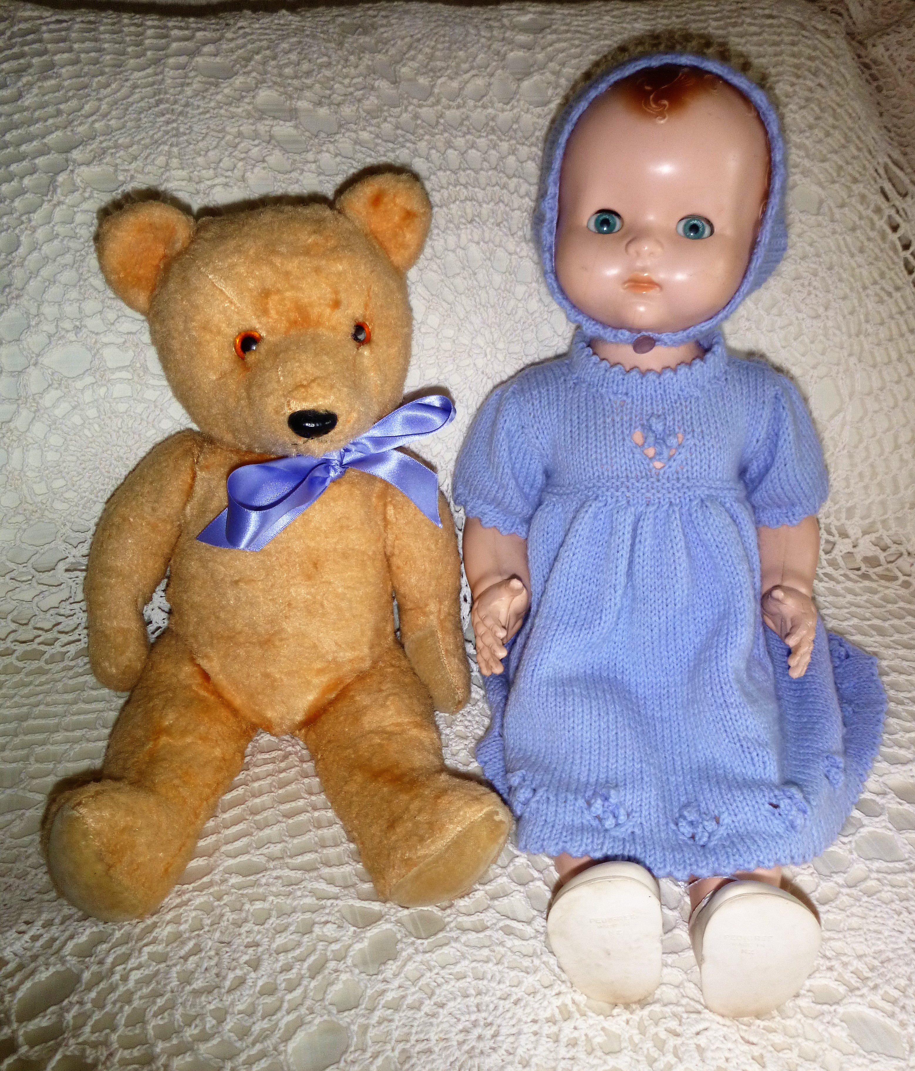 old doll and teddy